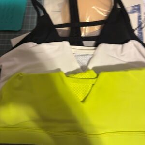 Vibrant Sports Bras in Black, White, and Neon Yellow